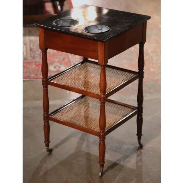 Elegant and highly functional, this antique Louis Philippe rafraîchissoir was originally designed as a refreshing station...