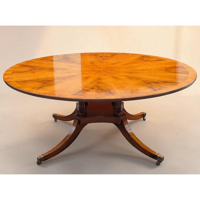 English Regency Revival 72-Inch Figured Elm Sunburst Center Pedestal Dining Table on Brass Casters For Sale - Image 4 of 18