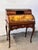 French 19C Vernis Martin Cylinder Slant Ladies Desk. The Louis XV style inlaid satinwood late 19th century desk is ormolu...