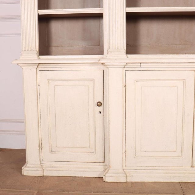 Large 19th C English country house breakfront pine bookcase, good architectural detail.1830 Can be easily dismantled into...