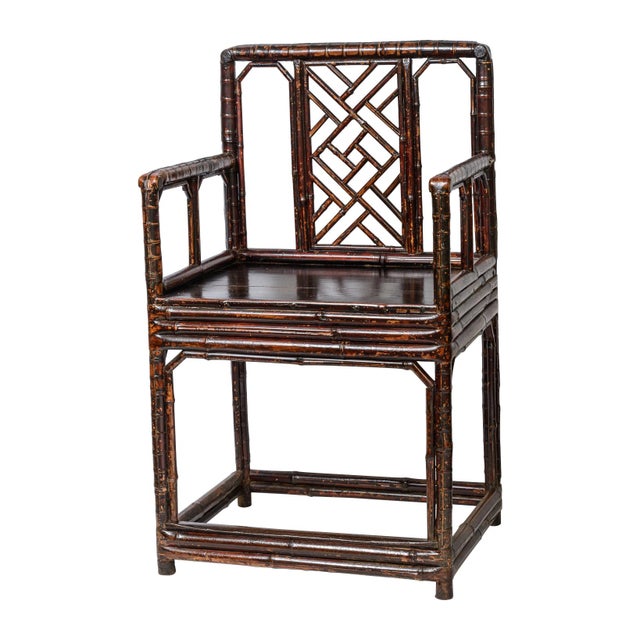 Just arrived this exceptional Pair of Early 19Th C. Chinese dark Tortoiseshell Bamboo Armchairs. These chairs have been...