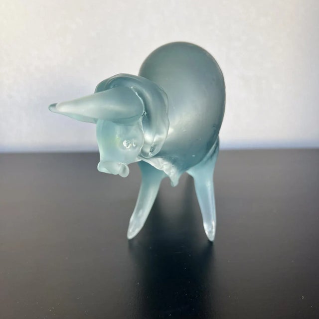 AMBIANIC presents Murano art glass bull figure sculpture Light blue tones, satin finish, yellow eyes. No signature...