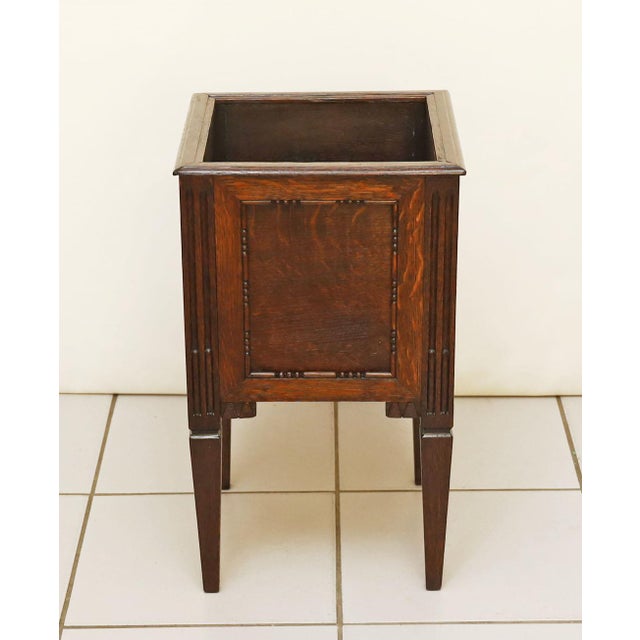 Biedermeier flower tray/stand, circa 1830. Carved oak, with beaded inlays. Brass fittings. Reversibly and expertly...