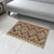 Elevate the elegance of your home with this stunning hand-woven tribal Kilim wool rug. Meticulously crafted on a loom by...