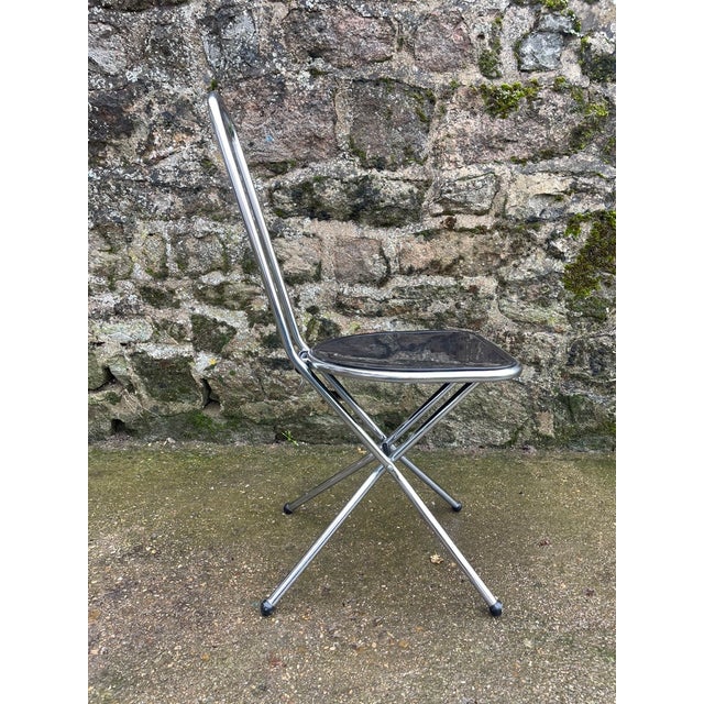 Folding chair from the 1980s Designed by Niels Gammelgaard for Ikea Lightweight and sturdy, chrome-plated metal frame...