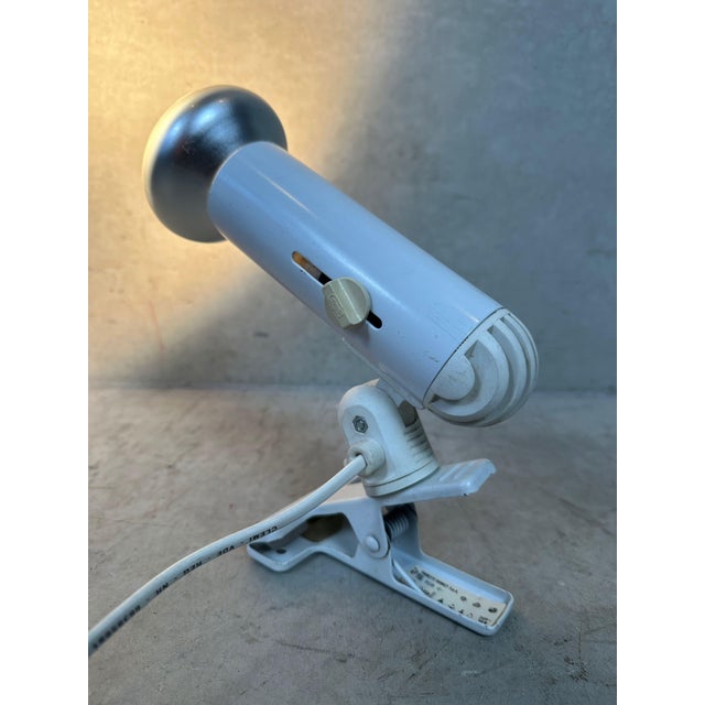 Fully functional vintage clamp spotlight by Targetti Sankey. Aluminium housing. Adjustable in all directions. Marked and...