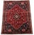 A richly colored vintage hand-knotted tribal rug attributed to the Shiraz/Qashqai weaving tradition of southwestern...