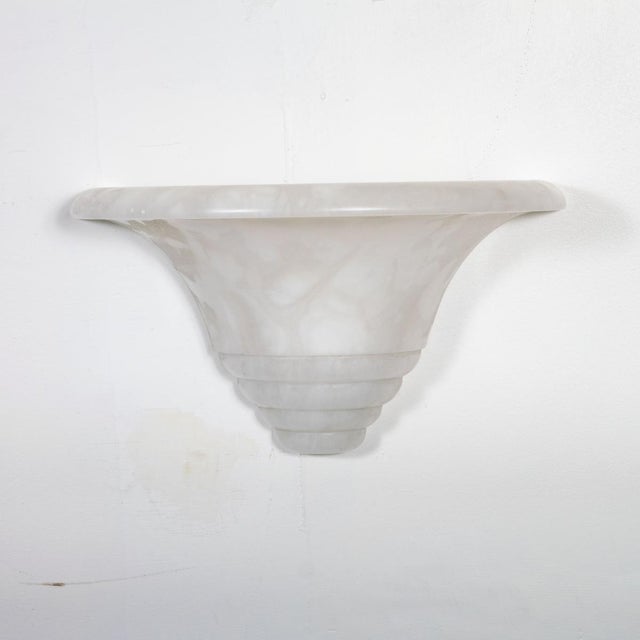 Single Art Deco inspired Spanish alabaster sconce. Each piece displays naturally occurring variations in color and veining.