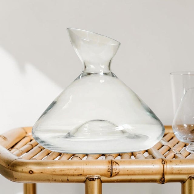Elevate your entertaining experience with this Contemporary Wide Base Clear Glass Wine & Spirits Decanter, designed to...