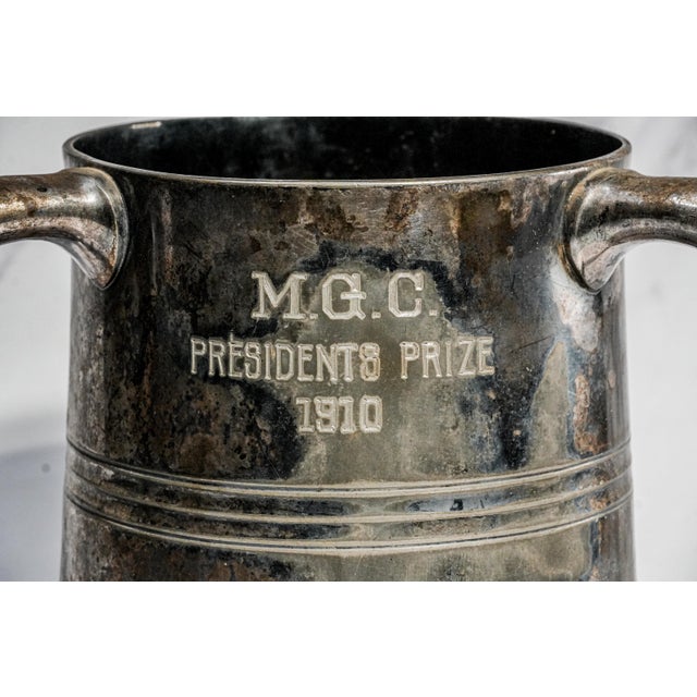 An impressive example of early 20th-century sporting memorabilia, this substantial circa 1910 silverplate presentation...