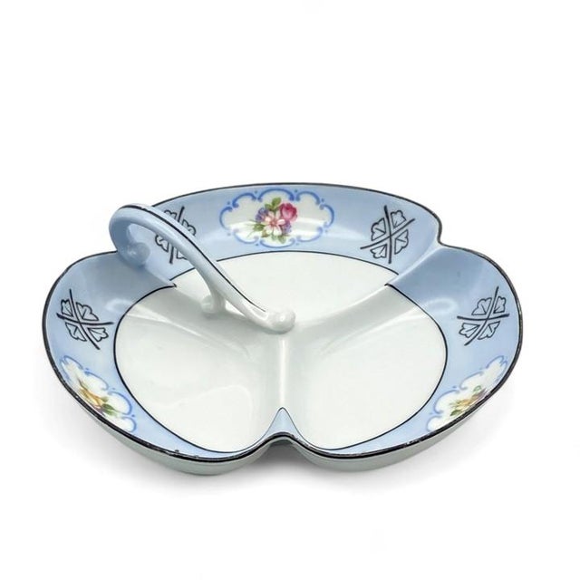Elegant 8½-inch divided porcelain dish from RS Germany. RS Germany is part of the wording in marks used by the Tillowitz,...