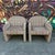 This is a pair of 1980s cheetah print accent chairs.