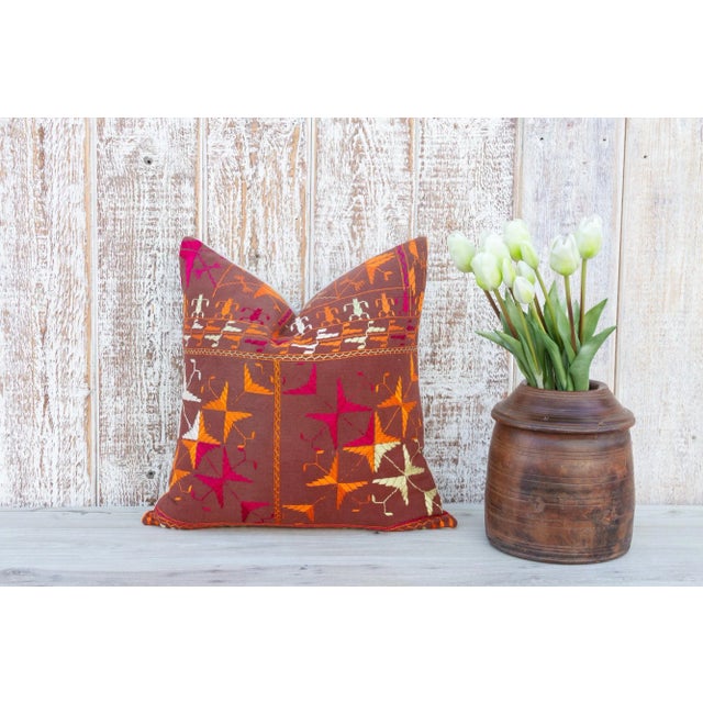 This colorful and luxurious Bagh Phulkari pillow features beautiful hand-done silk embroidery on top of a cotton fabric....