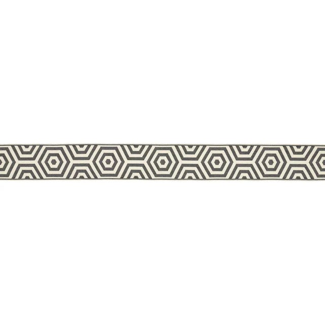 Hardworking and high style, Bees Knees Indoor/Outdoor Tape in black is a mod geometric trim designed by Mary McDonald. The...