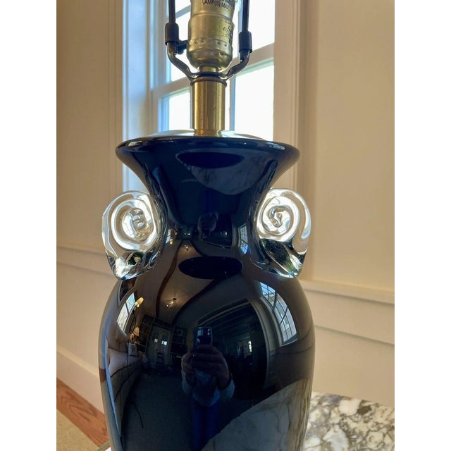This exquisite lamp by Frederick Cooper features a mirror gloss black finish, accented by two blown glass clear scrolls...