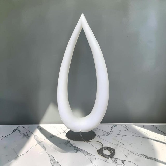 Very unique monumental tusk style floor lamp. This piece has an eye catching shape with a height of 69”. Made of a thick...