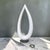 Very unique monumental tusk style floor lamp. This piece has an eye catching shape with a height of 69”. Made of a thick...