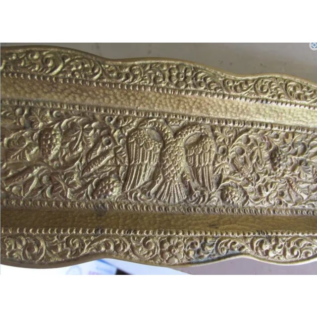 A vintage European brass pen, desk tray. The tray is decorated with a double headed eagle and measures 7 1/2" x 3".