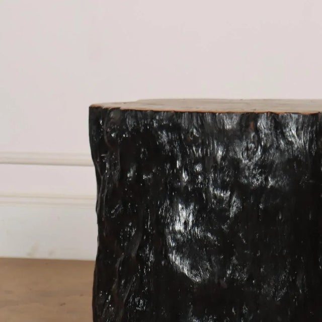 Primitive lychee side table. Hand carved and finished using a Japanese technique called Shou-Sugi Ban. This piece is...