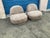 Designer pair of lounge chairs. Chairs swivel, fully upholstered. Chairs were newly upholstered in gray Boucle. No tags or...