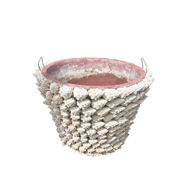 Rarely found at this scale, a substantial Italian terracotta "grotto" planter fully encrusted in the coquillage tradition,...