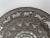 An Indian Silver Hand Made Chisiled Decorative Plate. India, 20th Century D: 10"