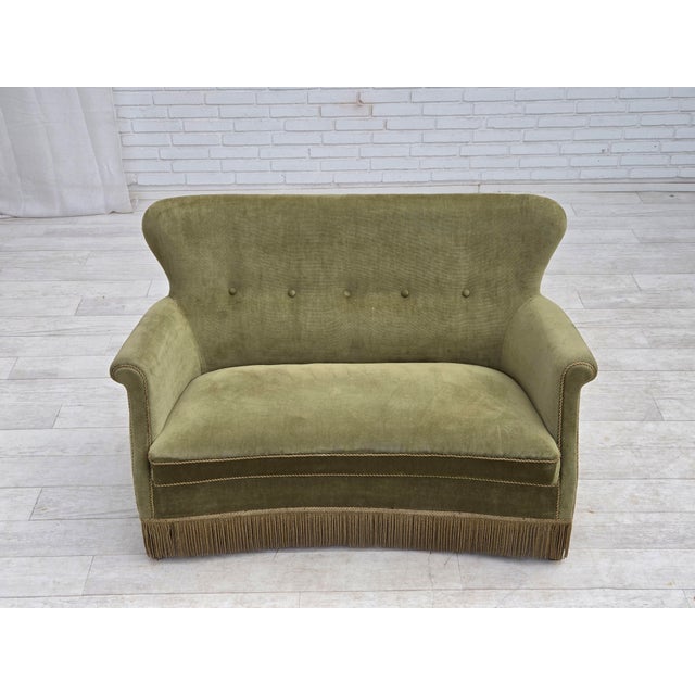 1970s, Danish 2-seater sofa. Light green furniture velour, ash wood legs, springs in the seat. Original good condition: no...