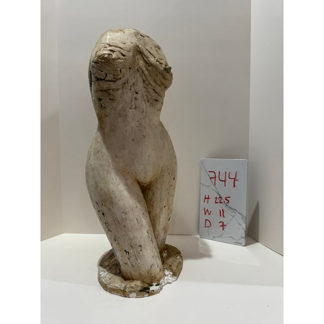 Larry Mohr (American, 1921-2013) female torso sculpture in painted plaster with warm beige patina and raised arms gesture....