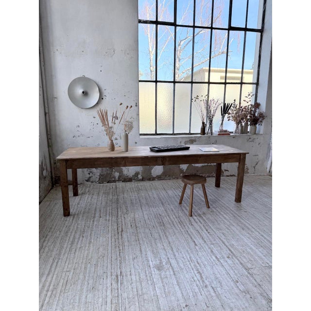 Antique large pine farmhouse table from the 1950s. We love its typical farmhouse look, with its slender, square legs,...