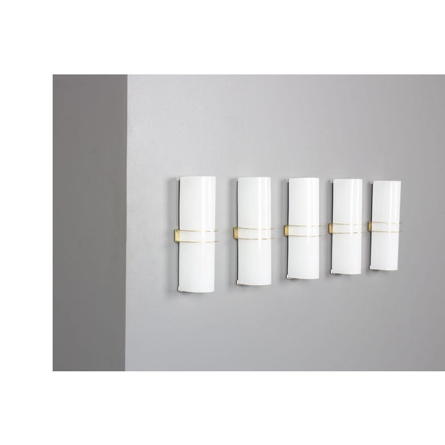 Set of 5 wall lights from Italy in the fifties Edited by Zonca Italia Brass and opaline Chic model This piece has an...