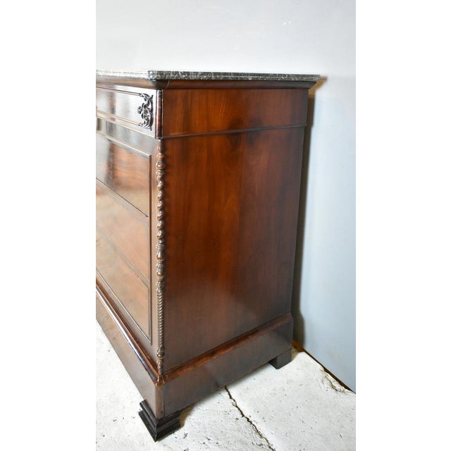 This is a very fine quality French chest of drawers constructed in the Louis Philippe period, around 1860. Sitting on top...