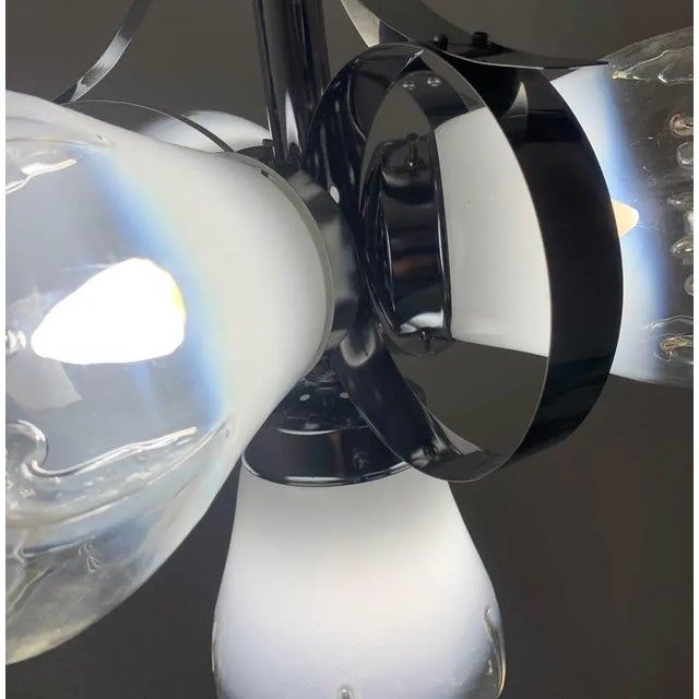 1970's Mazzega space age pendant lamp featuring Murano glass shades and chrome base. Often attributed to Toni Zuccheri....