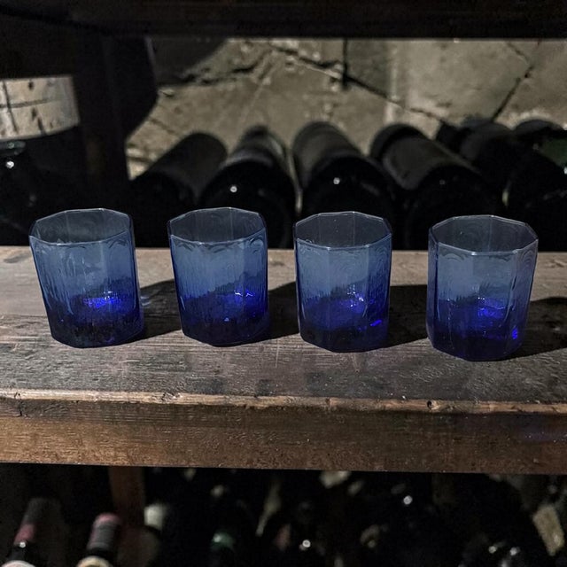 The Vintage Libby Blue Octagon Shaped Drinking Tumblers Rocks Glasses are a set of highball glasses from the mid-century...