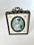 A late 19th Century hand painted mature portrait in a bone and Bronze frame with velvet backing and bronze twig like...