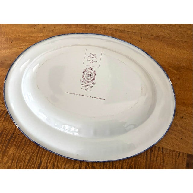 Blue and white vintage metal tea tray with Asian cherry tree motif. Designed in Long Island and made in England by "Daher...