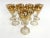 Eight Antique Gilded Venetian Wine Glasses Raised gilded decoration. Floret decoration along the stem. Dimensions: H 6.75"...
