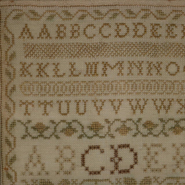 Antique Norfolk Sampler, 1845, by EJ White. The sampler is worked in silk threads on a linen ground, mainly in cross...
