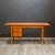 ABOUT A mid-century Teak writing desk with modular drawers that can sit on either the left or right side of the desk and...