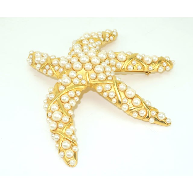 Mermaid treasure! Magnificent 1980's gold plated starfish brooch by Karl Lagerfeld with three dimensional lattice details...