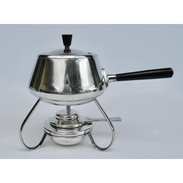 Vintage: 1970's Spring of Switzerland Cheese/chocolate fondue pot serving piece on a raised platform base with heating...