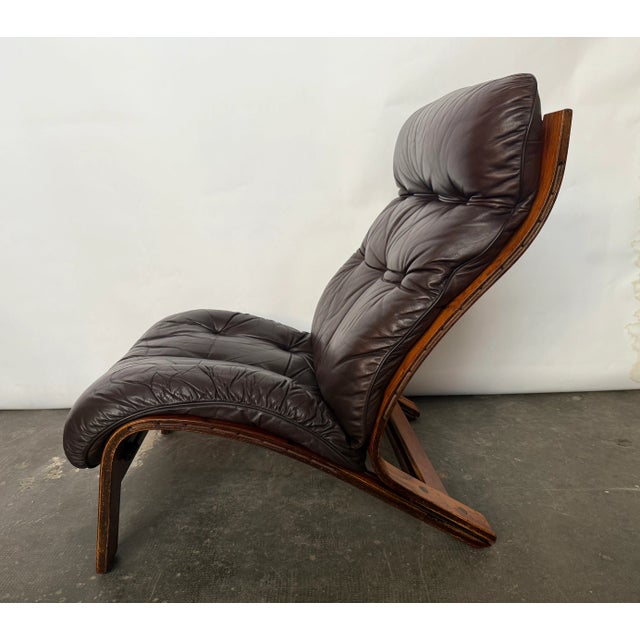 Nice bentwood and leather lounge chair, with very comfortable seat and headrest. Bentwood frame with canvas and rope seat...