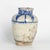 Impressive 18th Century Persian vase handcrafted in terra cotta in classic form, hand decorated in blue and white under a...