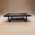 Large coffee table from the luxury furniture maker Holly Hunt. Substantial in size with a thick mahogany top and dark...