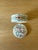 Authentic Tiffany & Co. porcelain trinket box with lid, made in Ireland. The lid has a hand-illustrated snake in teal, red...
