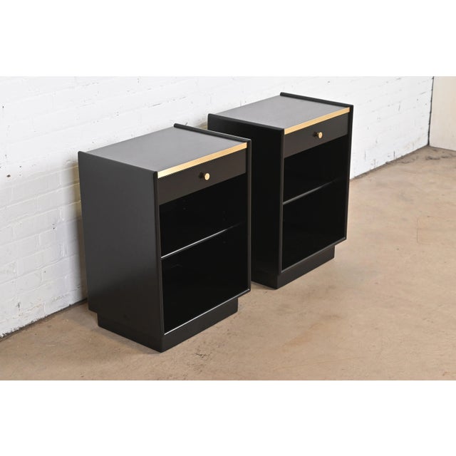 An exceptional pair of Mid-Century Modern nightstands By Harvey Probber USA, 1960s Black lacquered mahogany, with original...