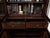 English bookcase made of solid mahogany in the style of Thomas Chippendale. The upper glass part with divided glass, the...