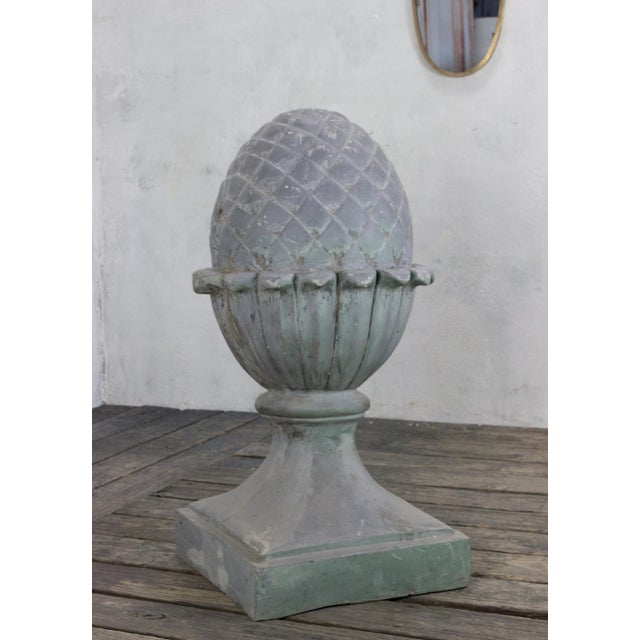 This fiberglass decoration in the shape of a pinecone is a truly interesting piece that is most likely a stage prop or a...
