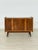 Beautiful, compact vintage chest of drawers in a timeless mid-century design. The piece impresses with its expressive,...