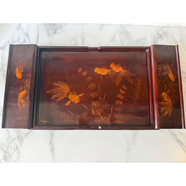1950s Signed Vietnamese Goldfish tea tray with two storage compartments. Material is beautiful lacquered wood.
