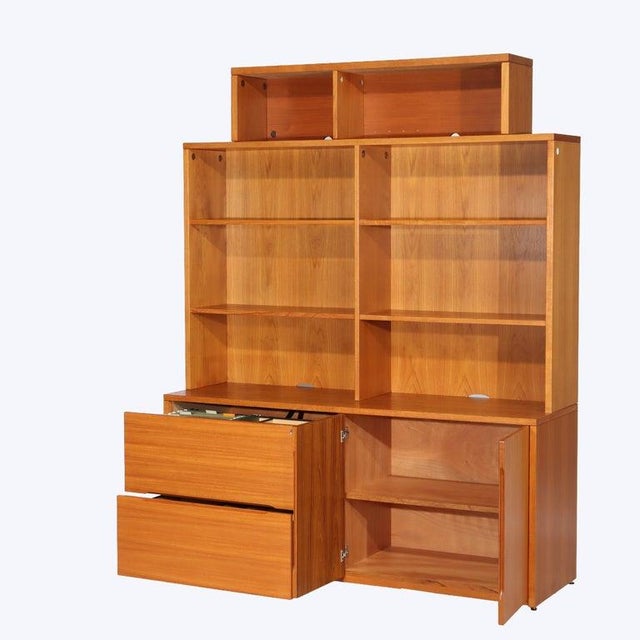 This Jesper Mid-Century Modern teakwood modular cabinet, dating to approximately 1960, offers a versatile storage...